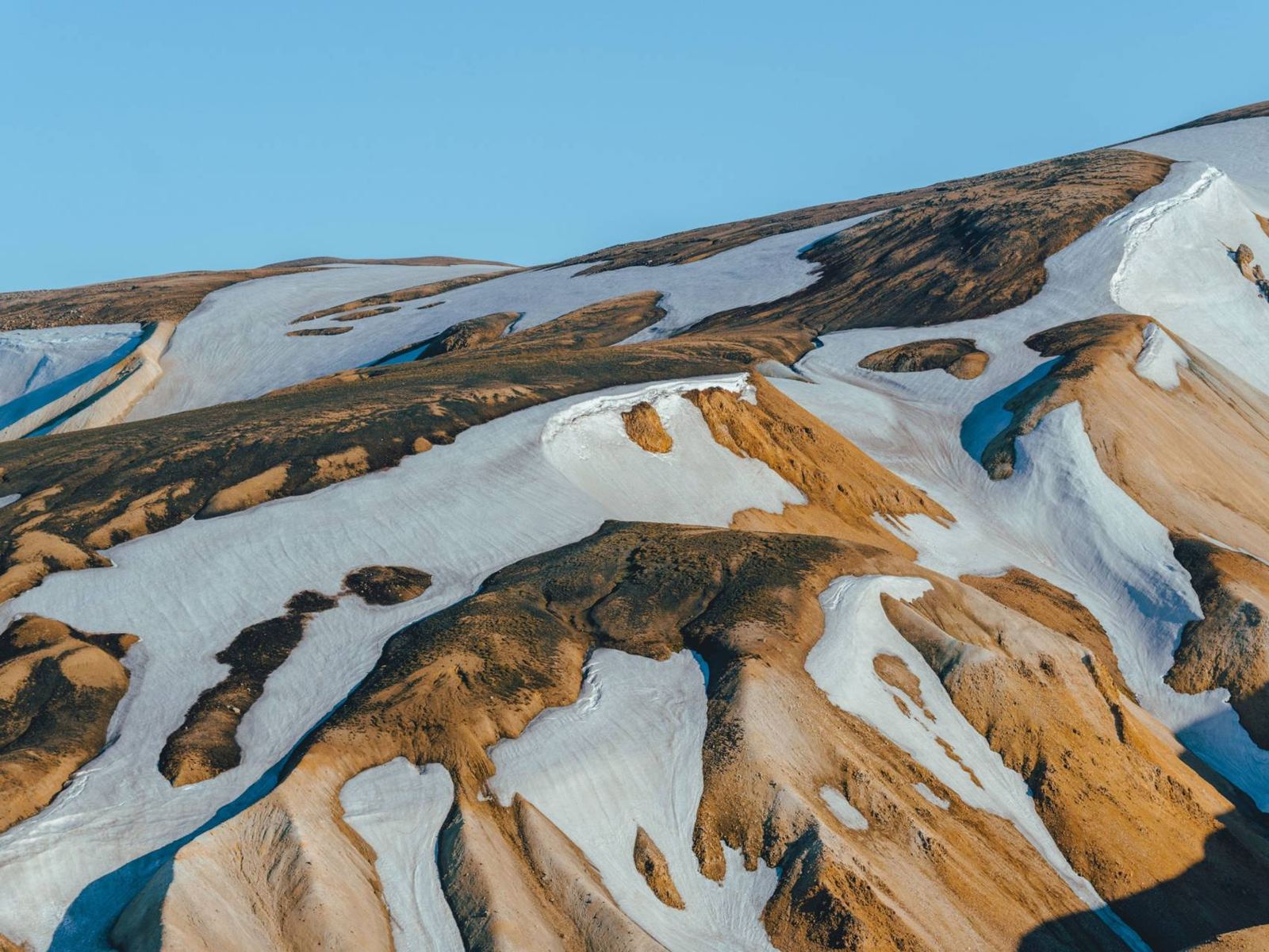 Snow-streaked rhyolite mountains in the Icelandic Highlands